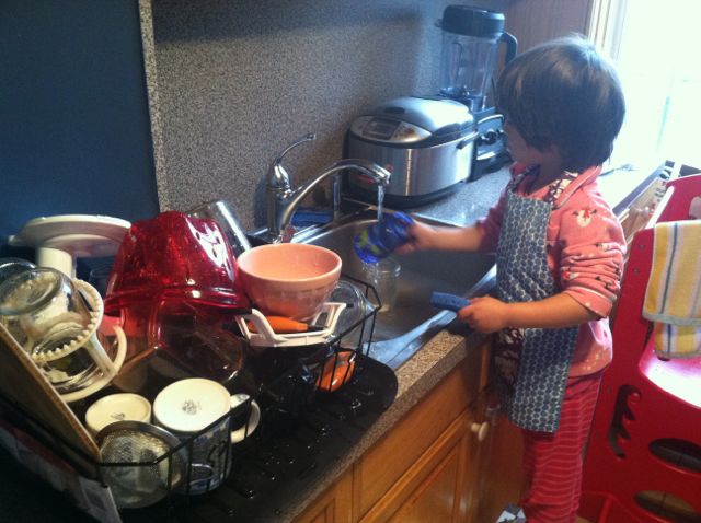 Brooke washed ALL of those dishes in the drying rack with just sponge and dish soap